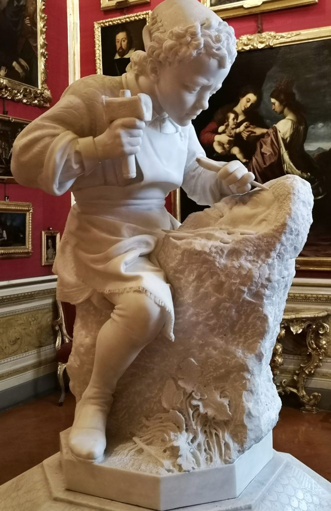 Young Michelangelo Carving a Faun's Head in Palazzo Pitti, Florence, Italy
